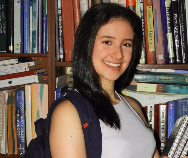 Ana Lucia Cayon, a Colombian student at the University of Alberta, in a library.