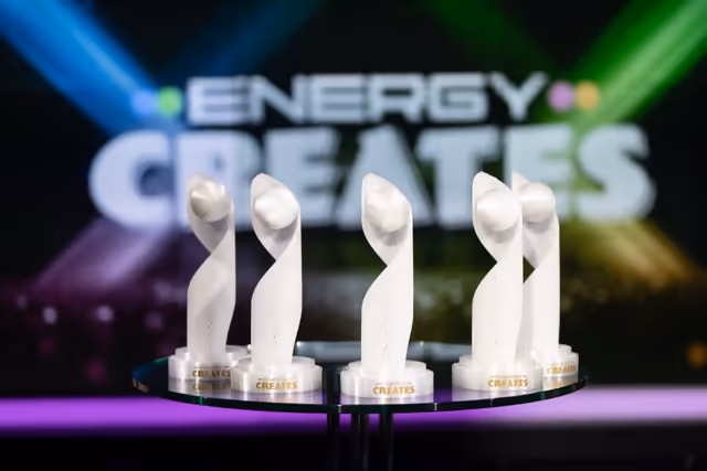 The five Energy Creates scholarship trophies on the award show stage.