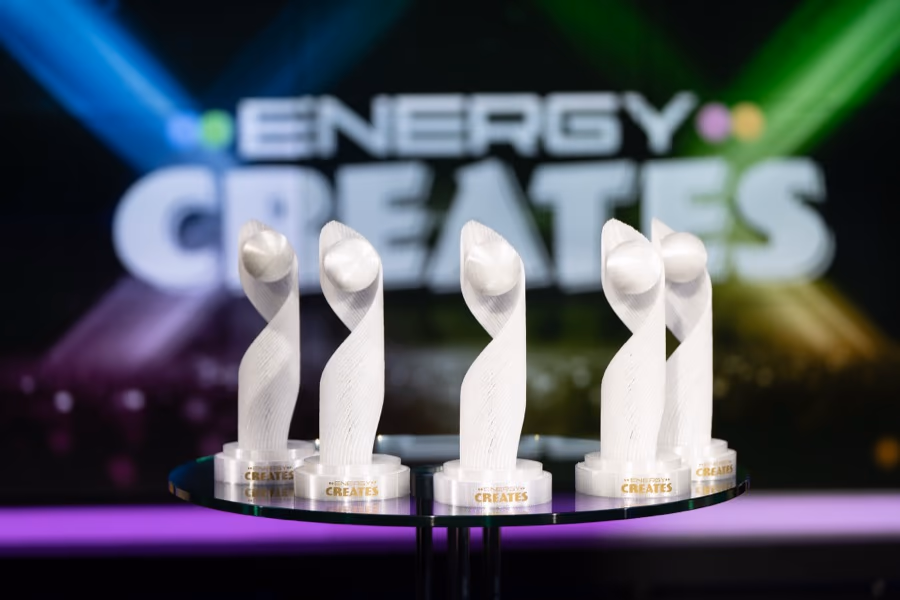 The five Energy Creates scholarship trophies on the award show stage.